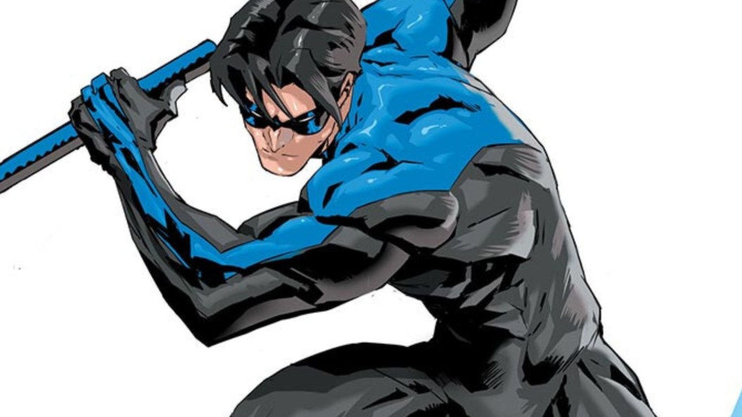 Nightwing crouched and ready to strike with escrima stick