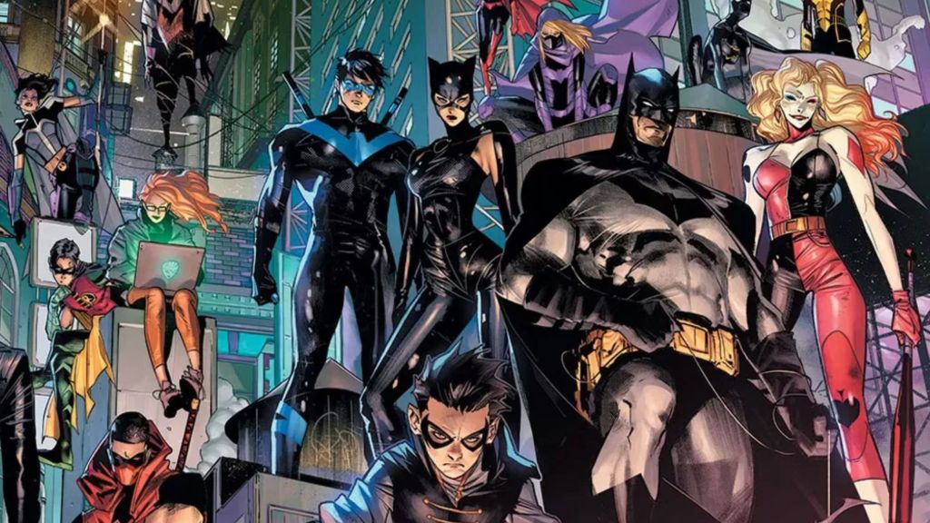 The Bat-Family standing on a roof.