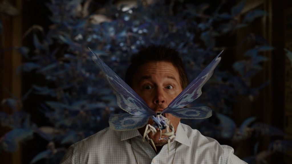 A Butterfly coming out of a guy's mouth in Peacemaker.