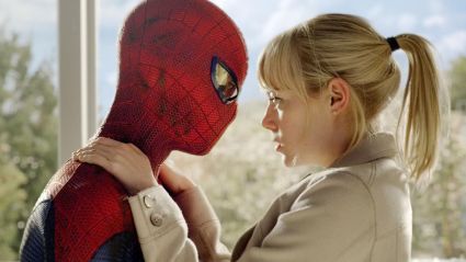 Peter Parker holding Gwen Stacy in The Amazing Spider-Man.