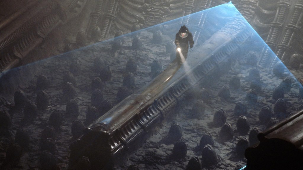 Kane (John Hurt) exploring the egg chamber in Alien