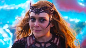 Elizabeth Olsen's Scarlet Witch smirking in Doctor Strange in the Multiverse of Madness