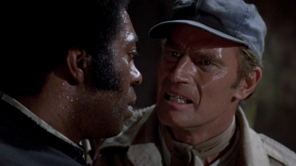 Lincoln Kilpatrick and Charlton Heston in Soylent Green