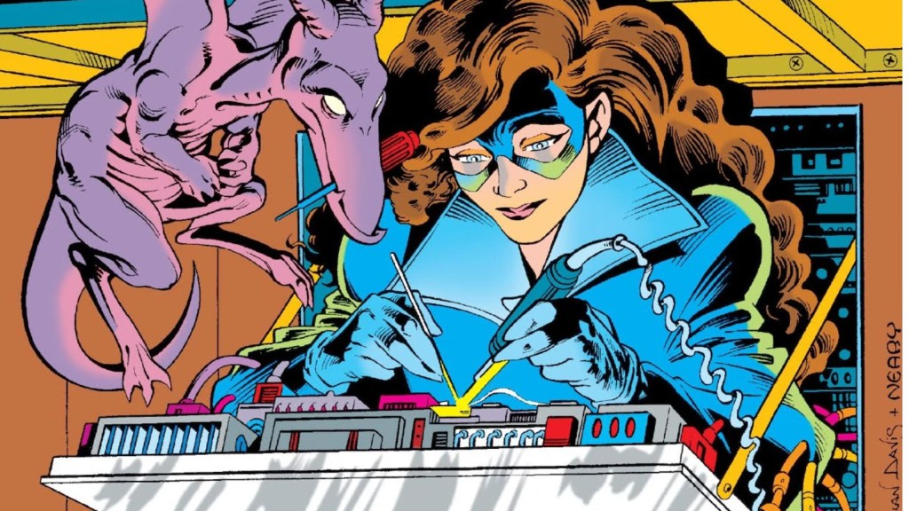 Kitty Pryde wearing her Shadowcat costume and working on a circuit board with Lockheed.
