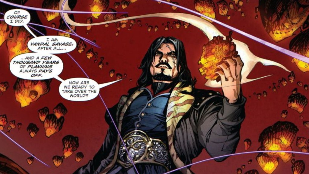 Vandal Savage pontificating while holding a glowing stone