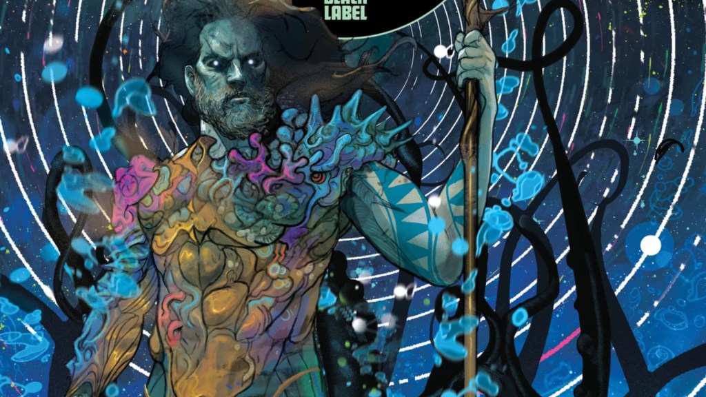 Aquaman standing holding his trident, surrounded by the waves of his aquatic telepathy