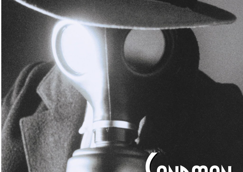 The Sandman wearing his gas mask and fedora