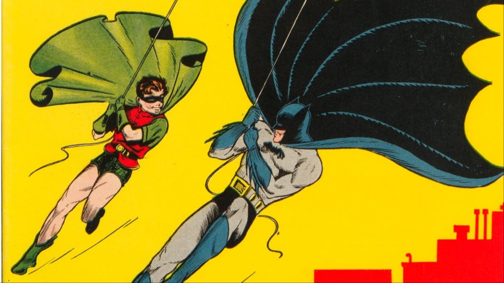 Batman and Robin swinging over the buildings of Gotham City