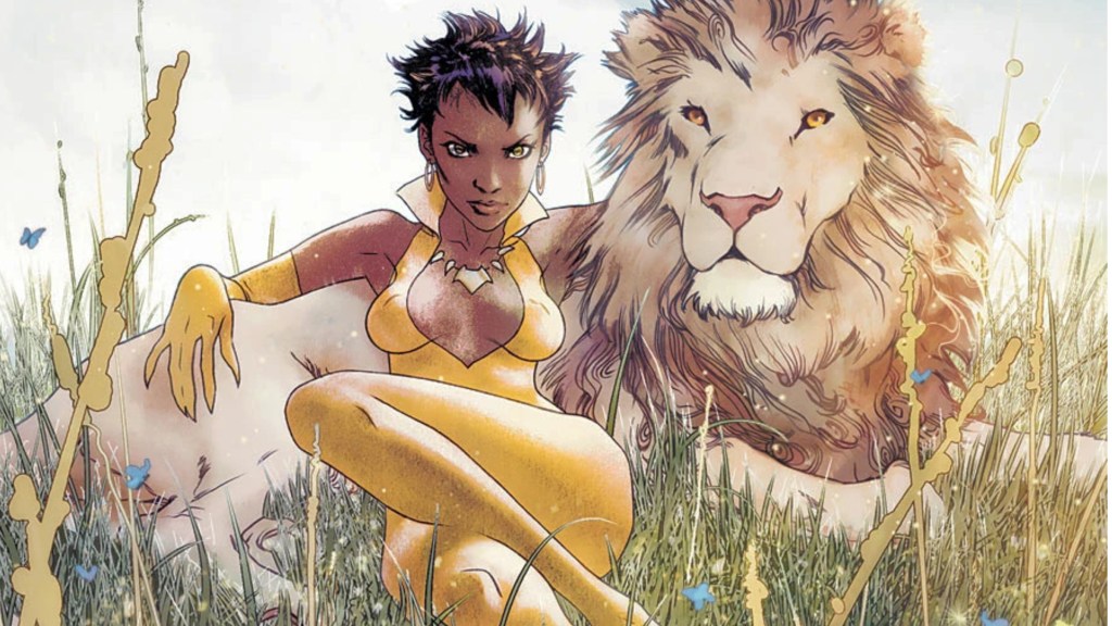 Vixen sitting next to a lion