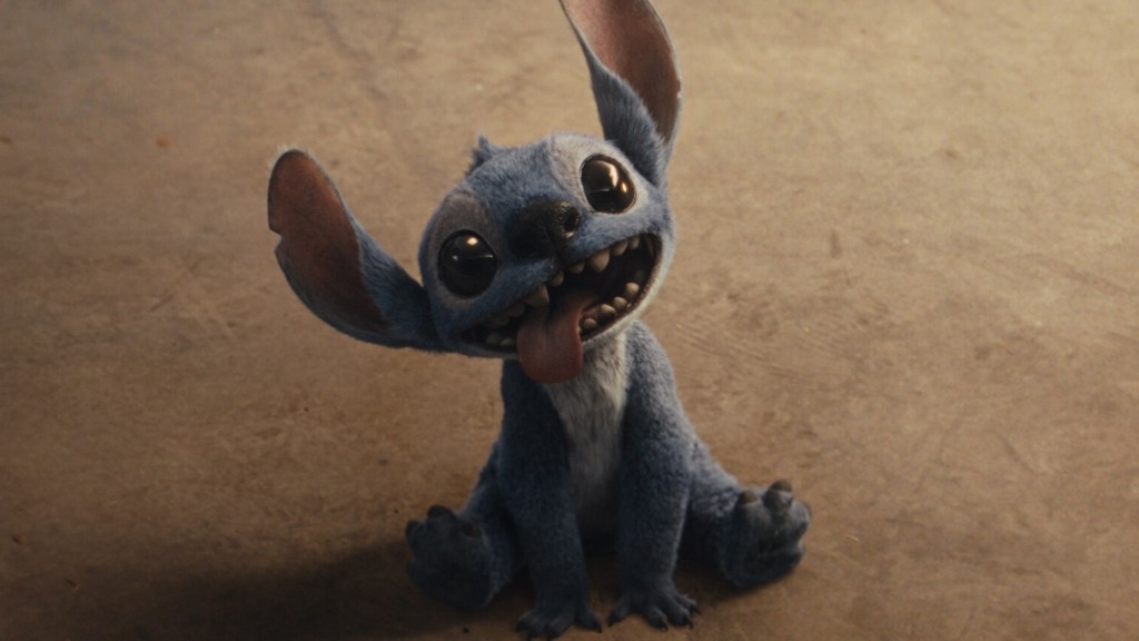 Stitch sitting in Lilo and Stitch 2025