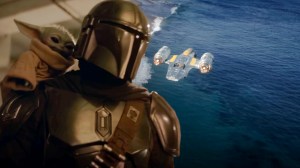 The Mandalorian and Grogu with the Razor Crest