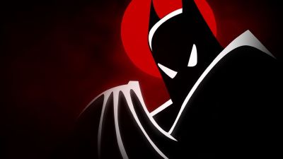 Batman holding his cape.
