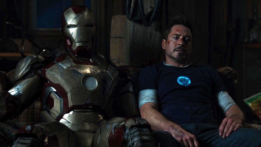 Robert Downey Jr. as Tony Stark in Iron Man 3 with his charging suit