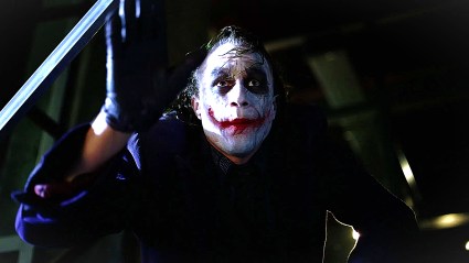 Heath Ledger as the Joker looking confused in The Dark Knight (2008)