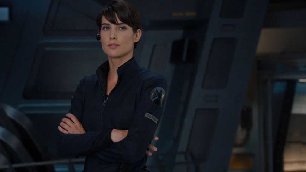 Maria Hill with her arms crossed.