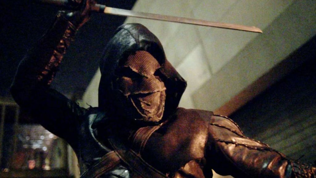 Prometheus swinging a sword.