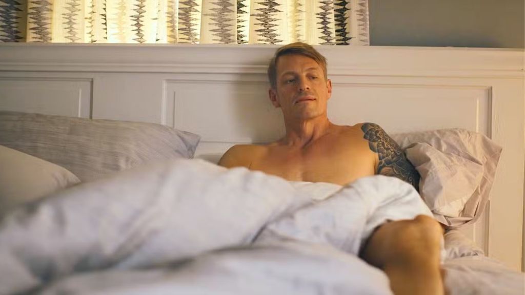 Rick Flag in bed in Peacemaker.