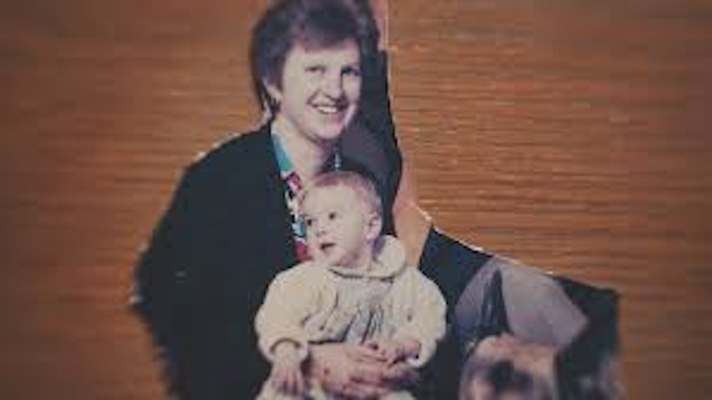 A child victim sits with her abuser in A Paedophile in My Family: Surviving Dad