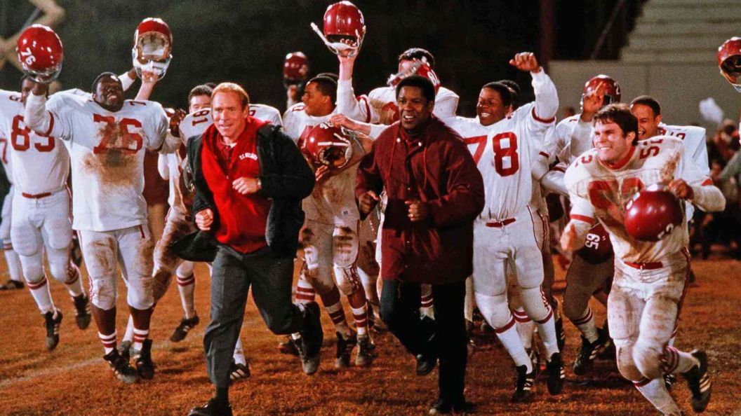 A sports club celebrating a victory in Remember the Giants