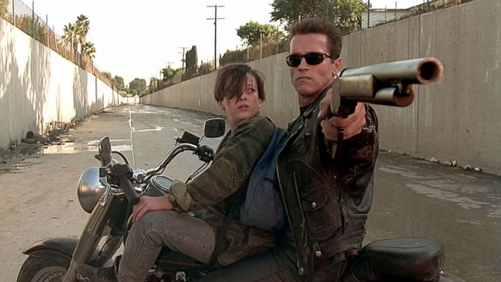 Arnold Schwarzenegger as T-800 and Edward Furlong as John Connor in Terminator 2 Judgment Day