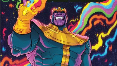 Thanos with the Infinity Gauntlet surrounded by rainbow energy
