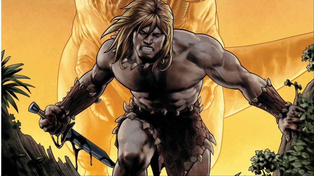 Ka-Zar grimacing with his arms spread, holding a knife with a dinosaur behind him
