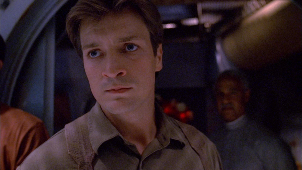 Nathan Fillion as Mal Reynolds in Firefly Out of Gas