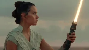 Rey with yellow lightsaber in Star Wars The Rise of Skywalker