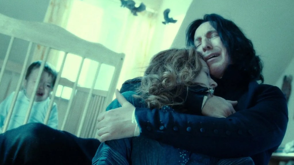 Snape holding Lily Potter while baby Harry cries in Harry Potter and the Deathly Hallows Part 2