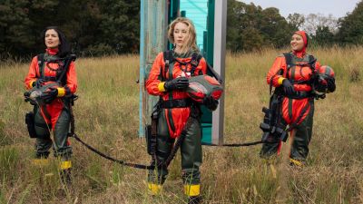 Sol Rodriguez, Jennifer Holland, and Anissa Matlock in Peacemaker Season 2