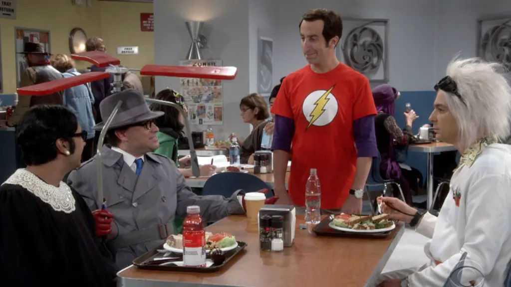 Sheldon dressed as Howard, Amy as Bernadette, Howard as Sheldon, and Leonard with a propeller on The Big Bang Theory