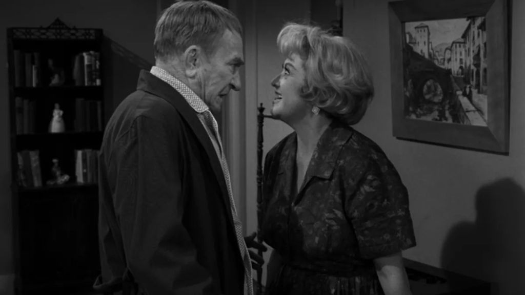 A man abuses his wife in "What's In ThHe Box" on The Twilight Zone