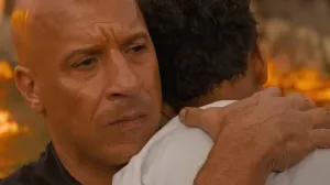 Dom holding his son.