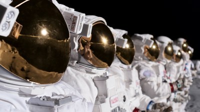 Spacesuits lined up on the moon