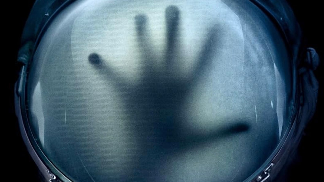 hand on space helmet on Life poster