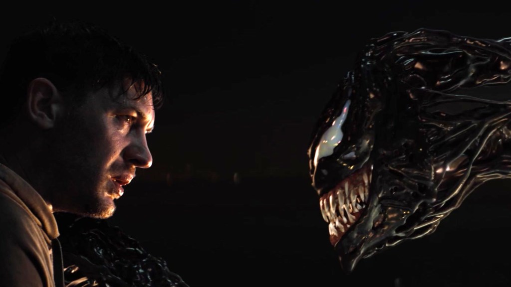 Tom Hardy as Eddie Brock speaking to Venom in Venom (2017)