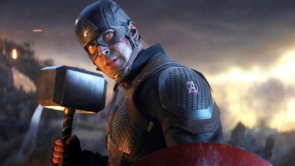 Chris Evans as Captain America holding Thor's hammer in Avengers: Endgame