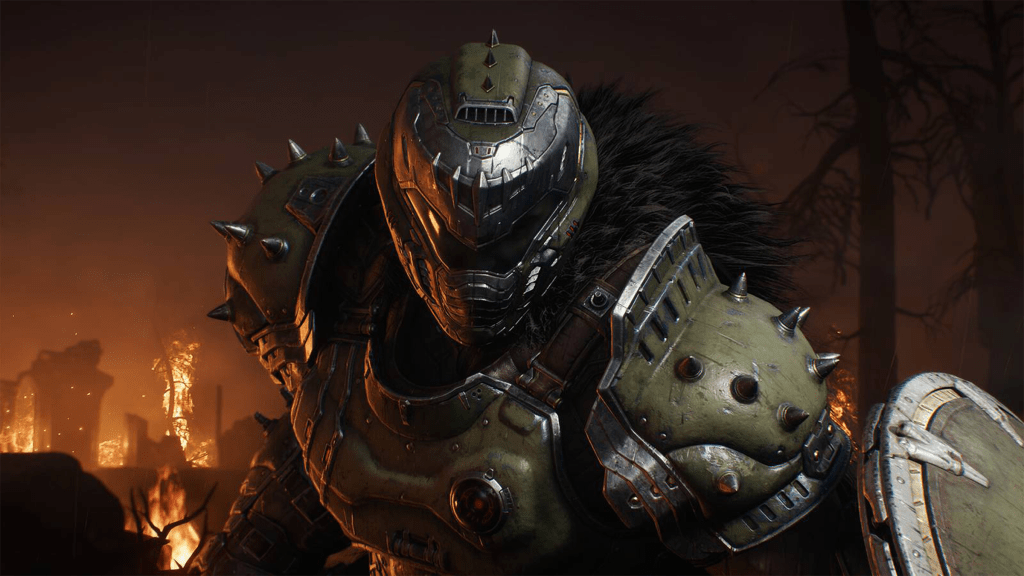 A screenshot from Doom: The Dark Ages, showing the Doom Slayer surrounded by a burning forest.
