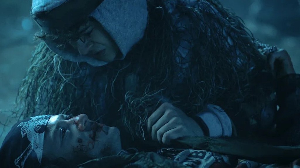 Dustin crying over Eddie as he dies in Stranger Things Season 4