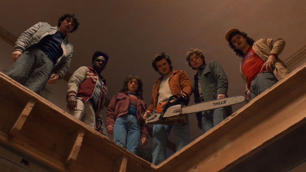 Finn Wolfhard as Mike, Caleb McLaughlin as Lucas, Natalia Dyer as Nancy, Joe Keery as Steve, Charlie Heaton as Jonathan, and Gaten Matarazzo as Dustin in STRANGER THING