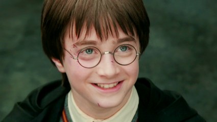 Harry Potter (Daniel Radcliffe) smiling in The Philosopher's Stone