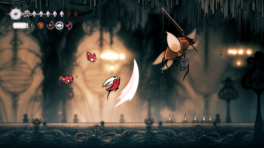 A screenshot from Hollow Knight, showing combat.