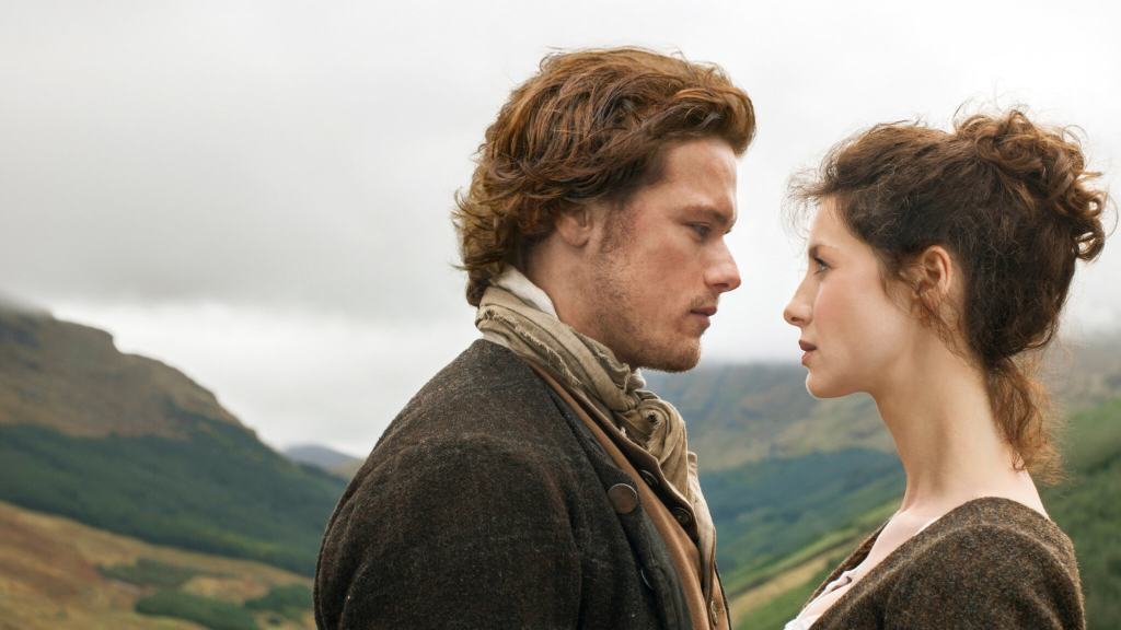 Jamie Fraser and Claire staring into each other's eyes in Outlander