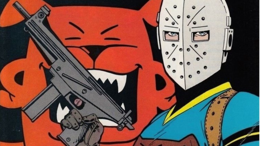 Wild Dog holding up his gun