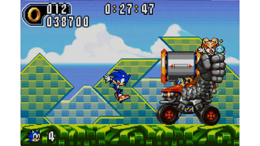 A screenshot from Sonic Advance 2, showing Sonic battling a mechanized monster.