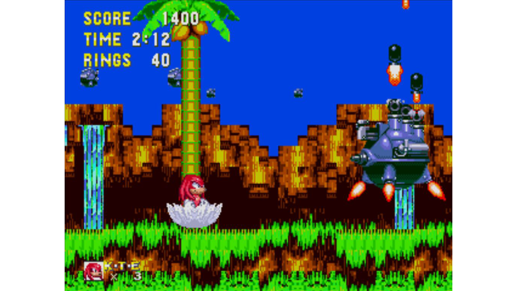 A screenshot from Sonic the Hedgehog 3, showing Knuckles fighting a boss.