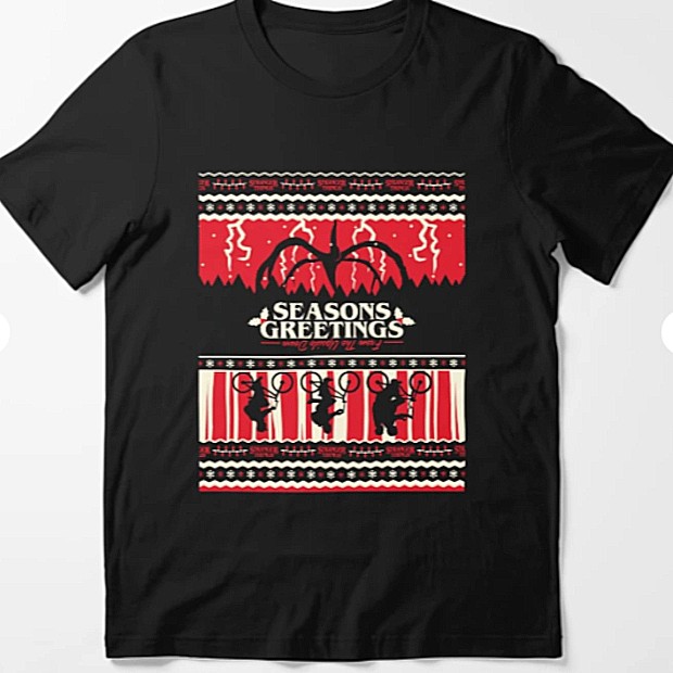 Black T-shirt with Mind Flayer silhouette and Stranger Things kids with "Seasons Greetings" 