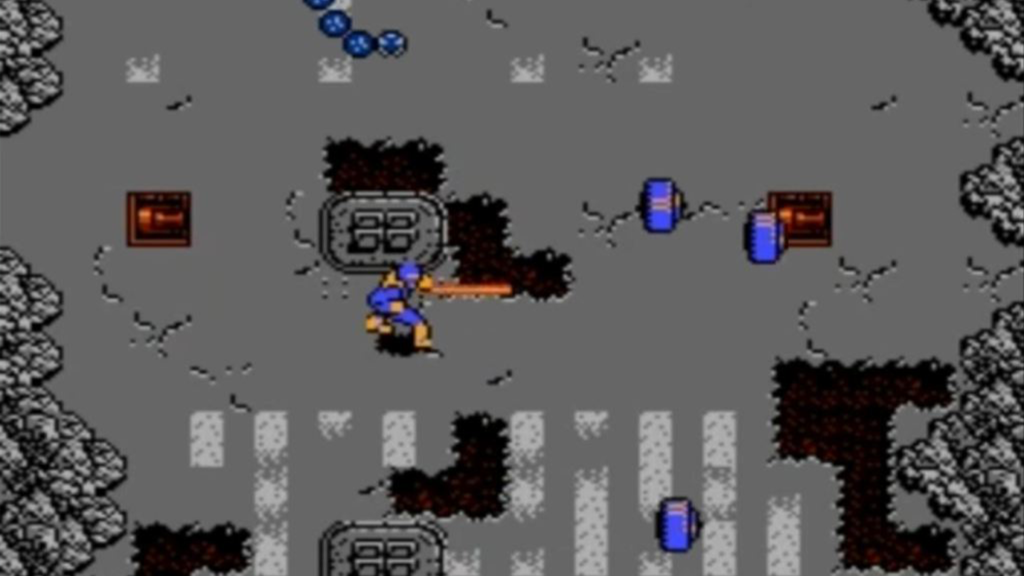 A screenshot from The Uncanny X-Men on the Nintendo Entertainment System, showing Cyclops shooting a blast from his eyes.