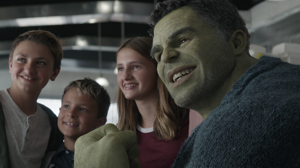 Hulk posing for a photo with fans in Avengers: Endgame (2019)