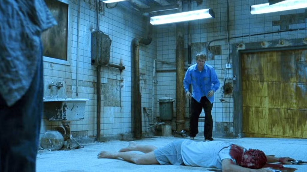 Still from the ending of Saw (2004)